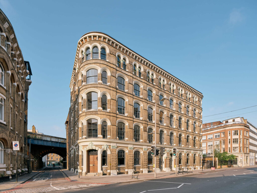 Menier Building exterior in London with heritage factory architecture